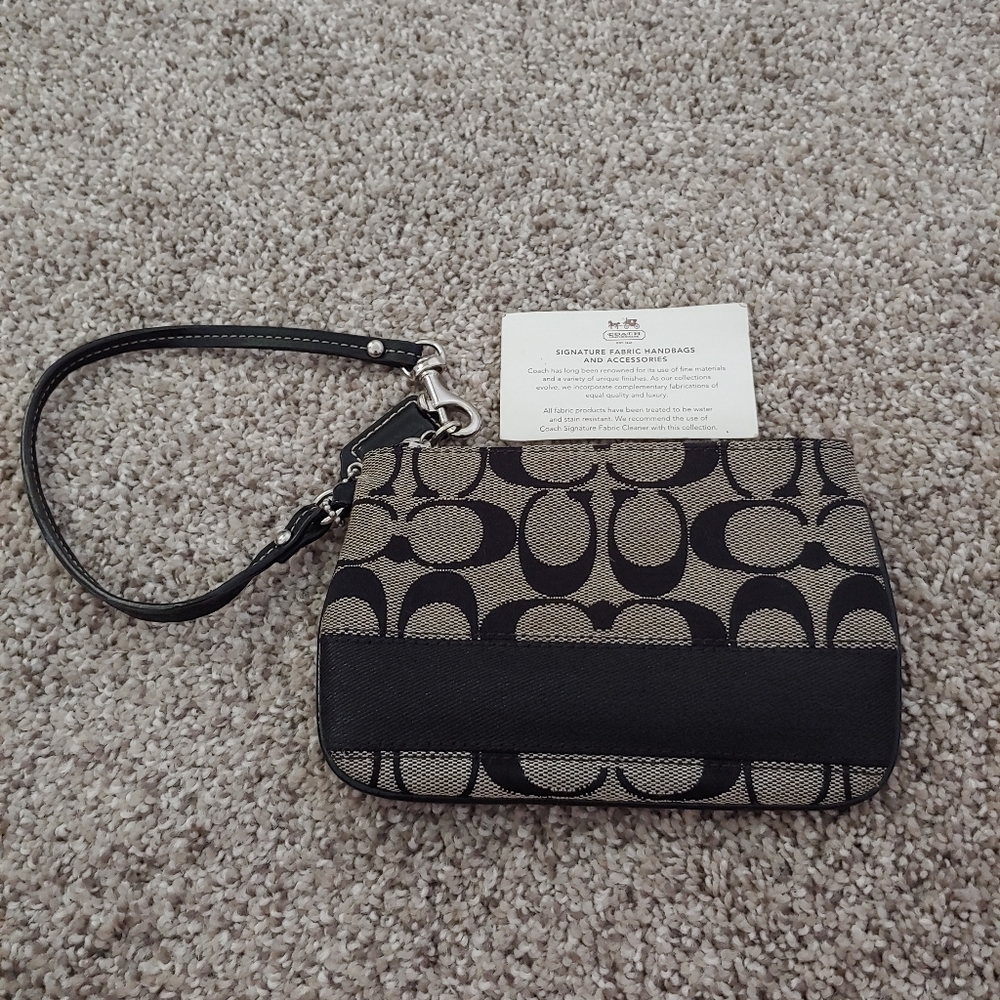 DONATING AFTER 6/25/21 Coach Signature Wristlet